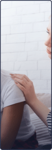 adolescent girl being comforted while in need of mood and thought disorder treatment for teens