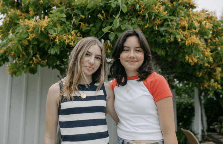 two teen girls wondering about the cost of teen mental health therapy and their payment options
