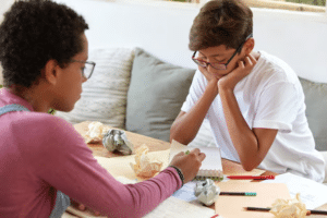 teens engaging in group art therapy