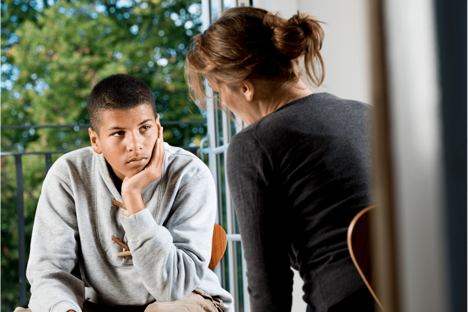 Boy getting therapy for some of the causes of depression