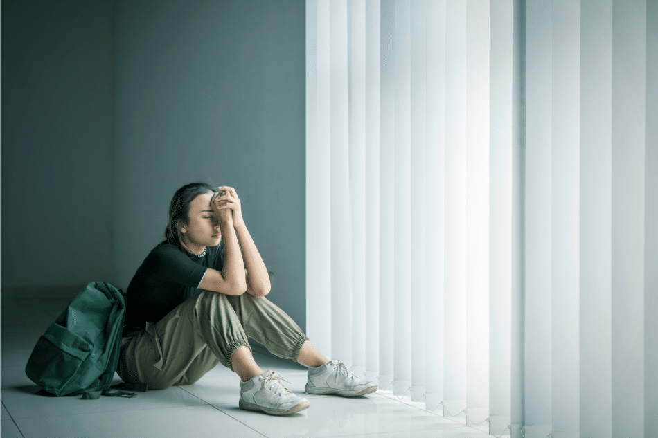 Teenage girl struggling with anger in school
