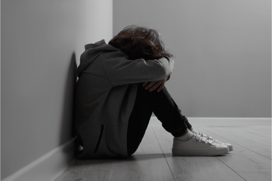 Teenage boy experiencing domestic abuse