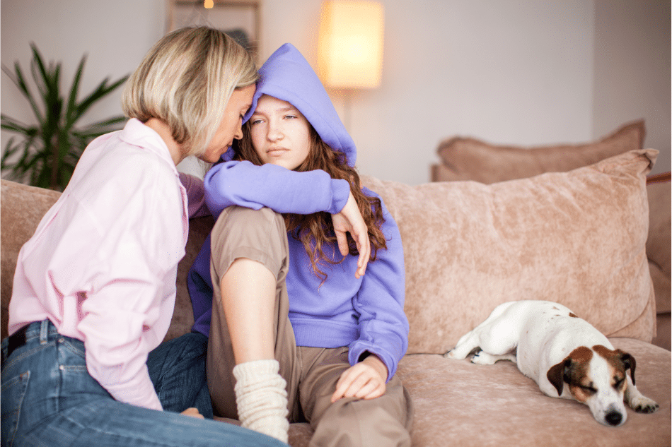 Woman supporting daughter with depression and anxiety