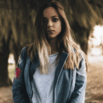 teenage girl looking sad outside wondering about IFS benefits for teens