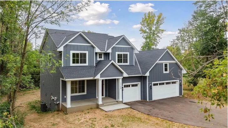 Modern Mission Prep two-story gray house with white trim.