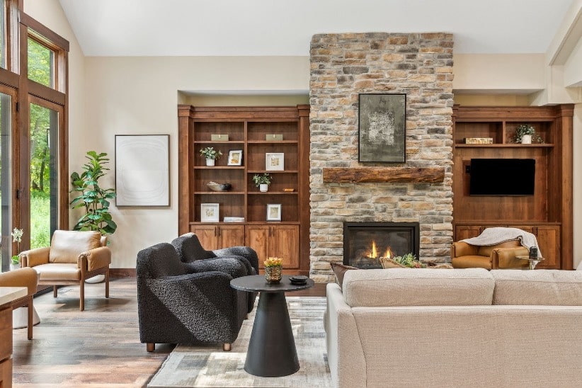 Mission Prep’s elegant living room with a stone fireplace.