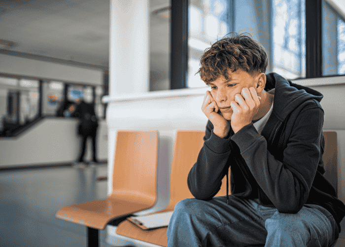 Teenage boy at the doctor's seeking support for frequent urination in teens