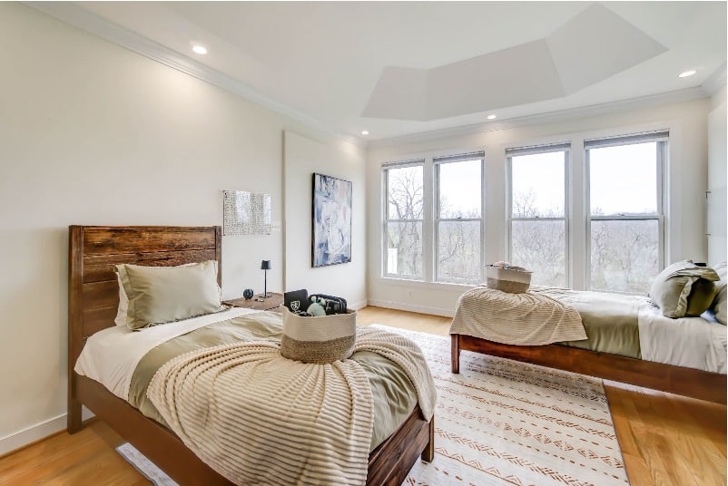 Mission Prep bright bedroom with two twin beds.