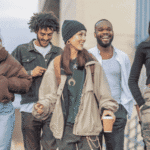 Group of youth walking and laughing after planning California youth mental health campaigns