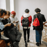 Teenagers in the hallway at school talking about youth mental health in Virginia