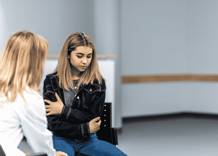 Teenage girl in therapy for adhd masking