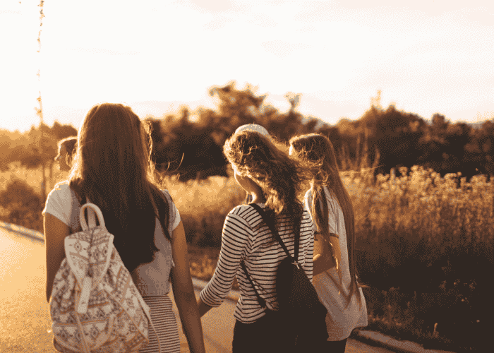 Group of teenage girls happy after therapy for adhd masking in teens