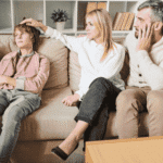 Parents sitting with teen on couch wondering how parents know it’s time for residential care