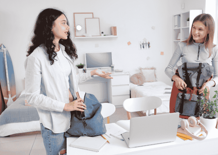 Teen girl and mom in bedroom packing after support with how to pack for residential treatment