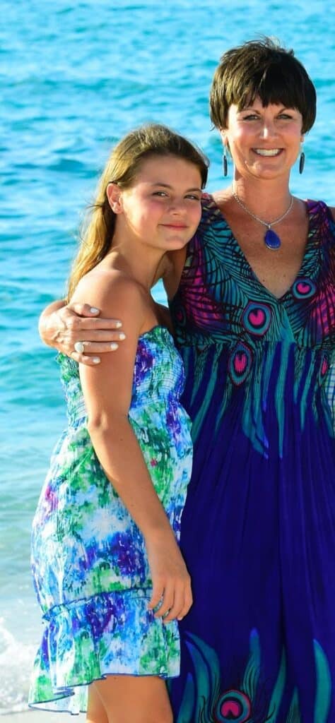 Jade and mom in front of water