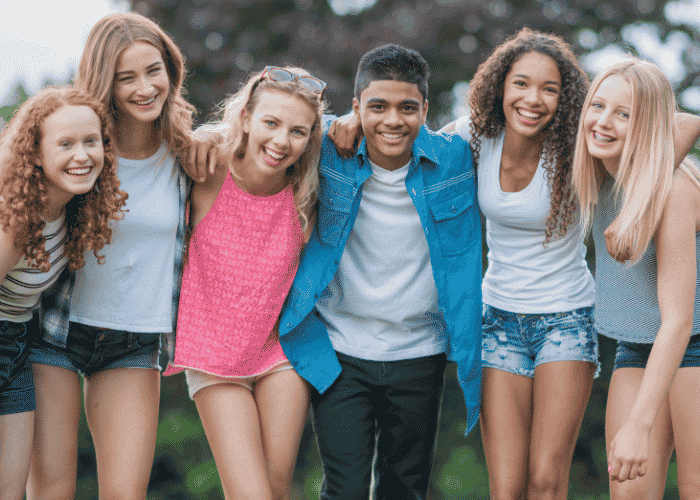 Teenagers together happy after intensive outpatient therapy