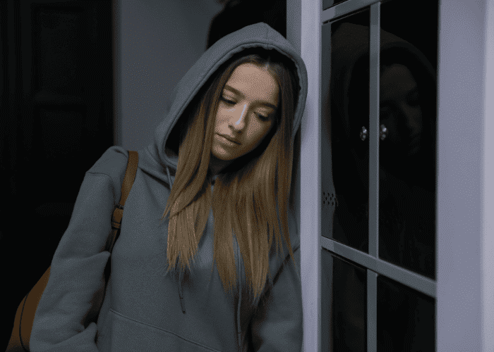 Sad teenage girl before self-esteem recovery in teens