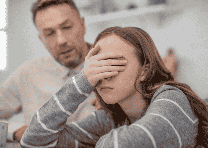 Teenage girl frustrated with dad, representing teen manipulation tactics