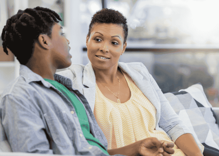 Mom talking with son after find out about the teen manipulation tactics