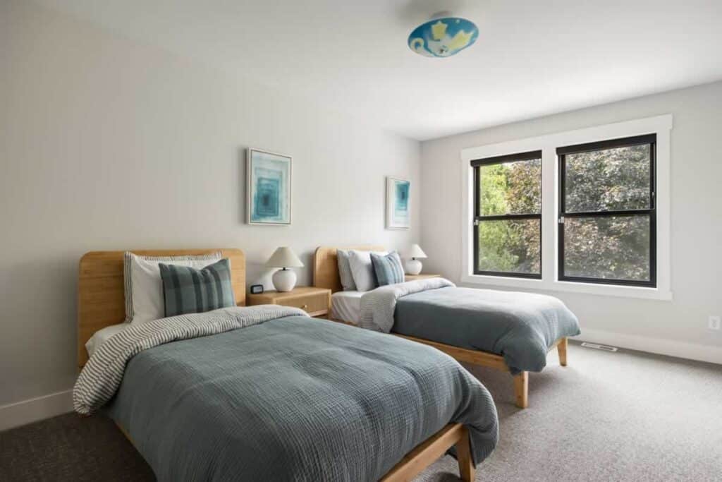 Two large beds in bright clean bedroom at Mission Prep Teen Treatment 4040 Tonkawood Rd, Minnetonka, MN 55345