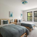 Two large beds in bright clean bedroom at Mission Prep Teen Treatment 4040 Tonkawood Rd, Minnetonka, MN 55345